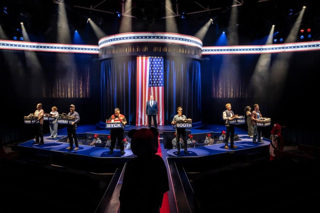 A-scene-from-Assassins-at-Chichester-Festival-Theatre-Photo-by-Johan-Persson A-scene-from-Assassins-at-Chichester-Festival-Theatre-Photo-by-Johan-Persson