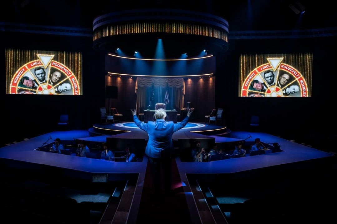 A-scene-from-Assassins-at-Chichester-Festival-Theatre-Photo-by-Johan-Persson A-scene-from-Assassins-at-Chichester-Festival-Theatre-Photo-by-Johan-Persson