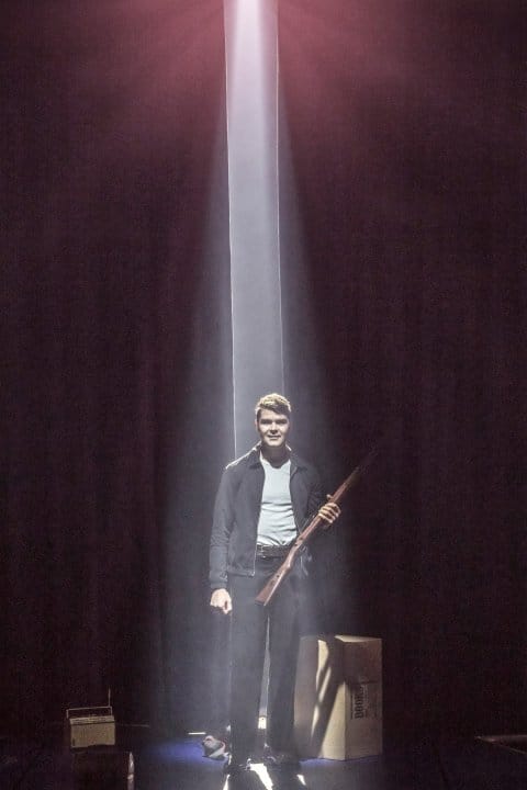 Samuel-Thomas-as-Lee-Harvey-Oswald-in-Assassins-at-Chichester-Festival-Theatre-Photo-by-Johan-Persson Samuel-Thomas-as-Lee-Harvey-Oswald-in-Assassins-at-Chichester-Festival-Theatre-Photo-by-Johan-Persson
