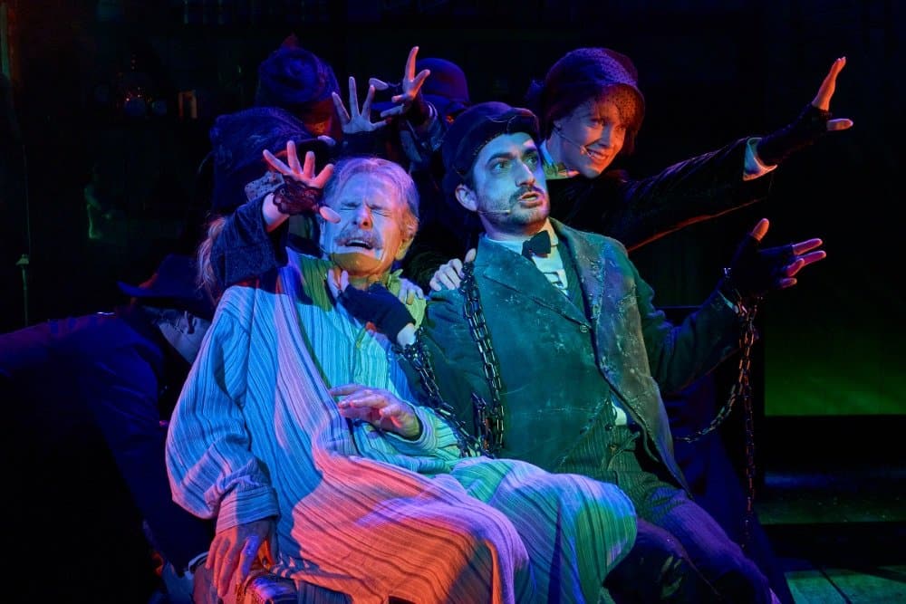 7.-DOLLY-PARTONS-SMOKY-MOUNTAIN-CHRISTMAS-CAROL.-Robert-Bathurst-Scrooge-George-Maguire-and-The-Company.-Photo-Manuel-Harlan 7.-DOLLY-PARTONS-SMOKY-MOUNTAIN-CHRISTMAS-CAROL.-Robert-Bathurst-Scrooge-George-Maguire-and-The-Company.-Photo-Manuel-Harlan