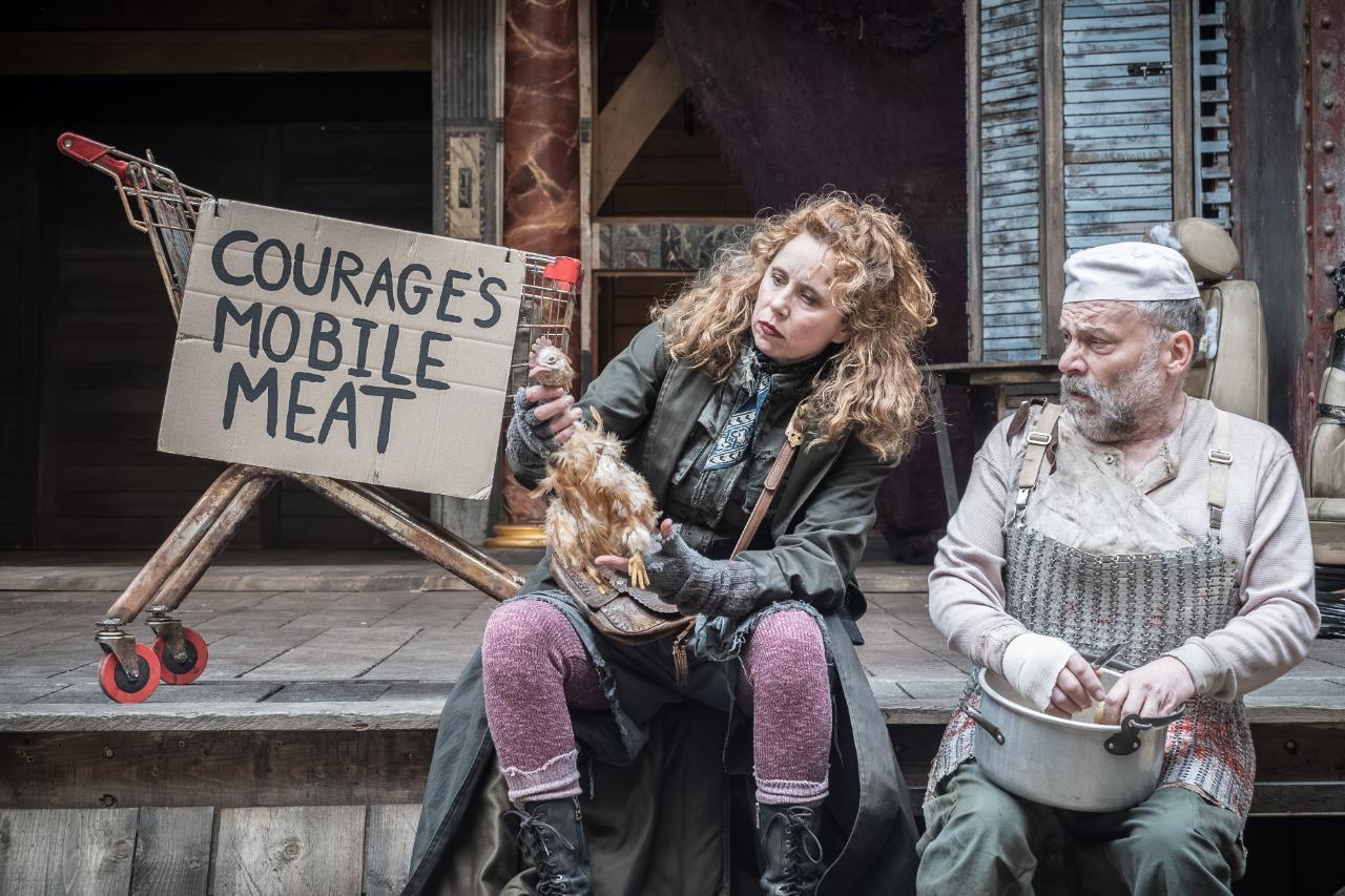 1.-Michelle-Terry-as-Mother-Courage-and-Nicolas-Tennant-as-Chef-in-Mother-Courage-and-Her-Children-at-Shakespeares-Globe-c.-Marc-Brenner 1.-Michelle-Terry-as-Mother-Courage-and-Nicolas-Tennant-as-Chef-in-Mother-Courage-and-Her-Children-at-Shakespeares-Globe-c.-Marc-Brenner