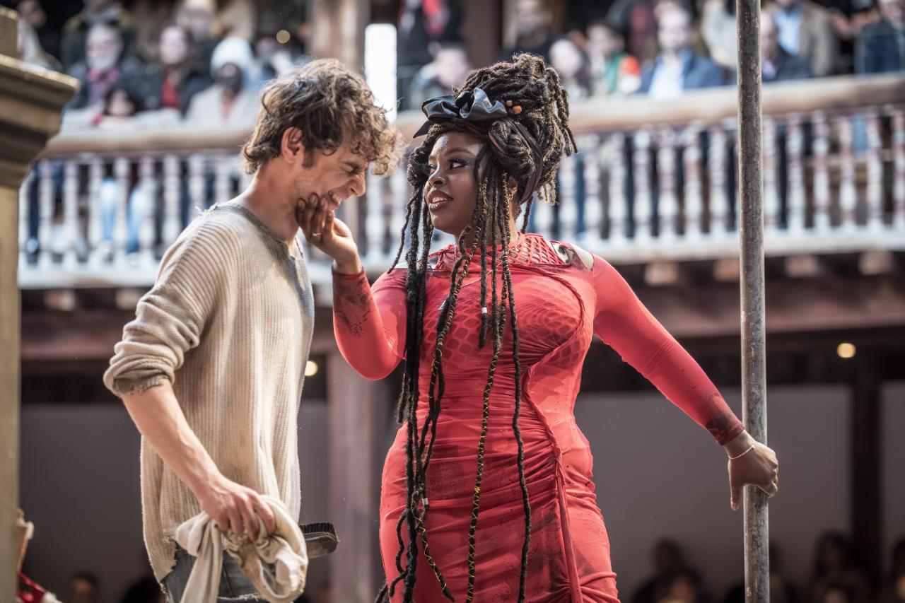 Rawaed-Asde-as-Swiss-Cheese-and-Nadine-Higgin-as-Yvette-in-Mother-Courage-and-Her-Children-at-Shakespeares-Globe-c.-Marc-Brenner Rawaed-Asde-as-Swiss-Cheese-and-Nadine-Higgin-as-Yvette-in-Mother-Courage-and-Her-Children-at-Shakespeares-Globe-c.-Marc-Brenner