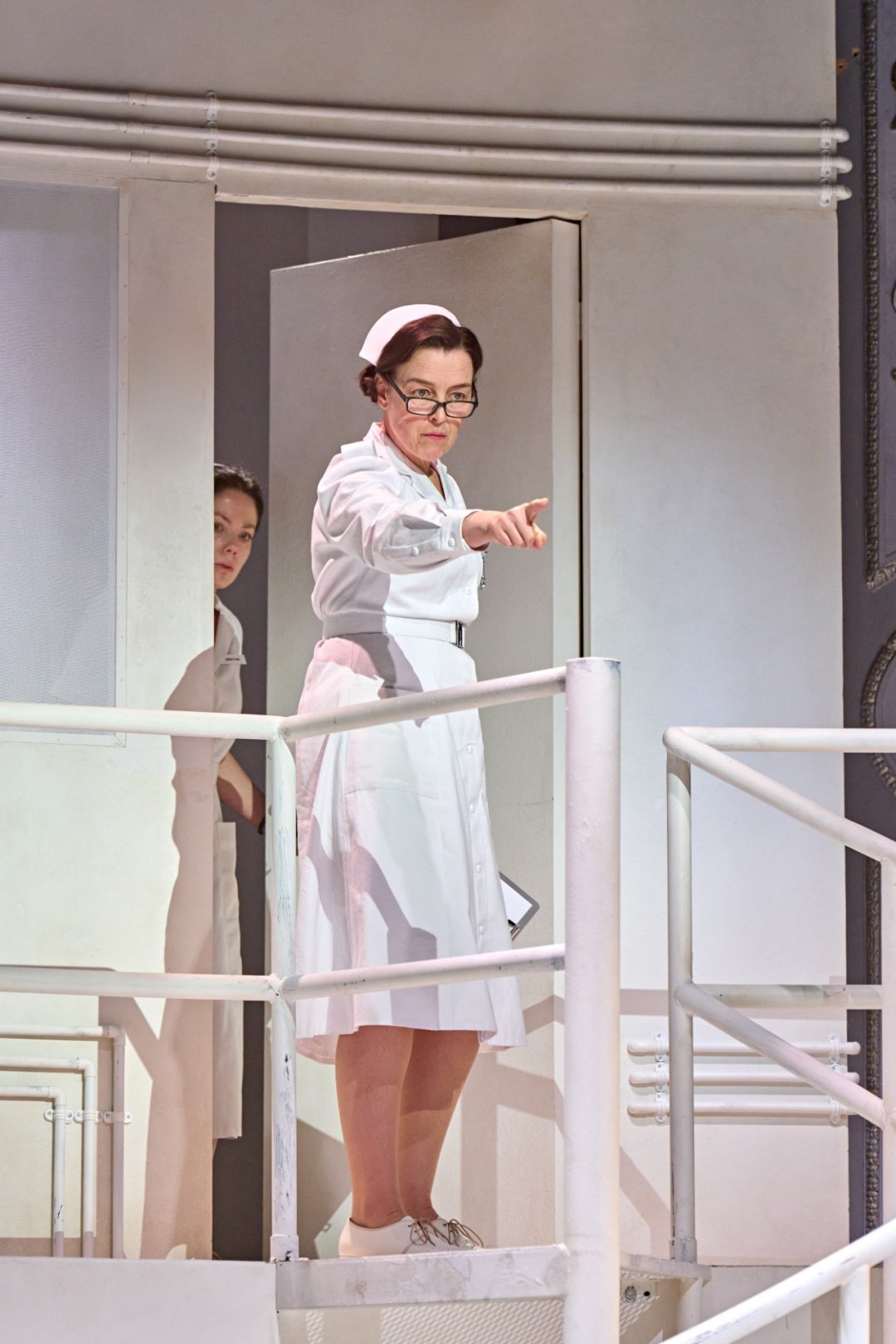 8.-Olivia-Williams-Nurse-Ratched-and-Amy-Newton-Nurse-Flinn-in-One-Flew-Over-the-Cuckoos-Nest-at-The-Old-Vic-2026.-Photo-by-Manuel-Harlan 8.-Olivia-Williams-Nurse-Ratched-and-Amy-Newton-Nurse-Flinn-in-One-Flew-Over-the-Cuckoos-Nest-at-The-Old-Vic-2026.-Photo-by-Manuel-Harlan