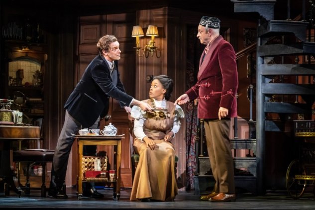 Harry-Hadden-Paton-as-Professor-Henry-Higgins-Amara-Okereke-as-Eliza-Doolittle-and-Malcolm-Sinclair-as-Colonel-Pickering.-Credit-Marc-Brenner Harry-Hadden-Paton-as-Professor-Henry-Higgins-Amara-Okereke-as-Eliza-Doolittle-and-Malcolm-Sinclair-as-Colonel-Pickering.-Credit-Marc-Brenner