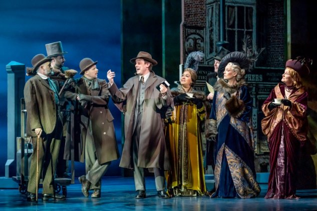 Harry-Hadden-Paton-as-Professor-Henry-Higgins-and-the-company-of-My-Fair-Lady.-Credit-Marc-Brenner Harry-Hadden-Paton-as-Professor-Henry-Higgins-and-the-company-of-My-Fair-Lady.-Credit-Marc-Brenner