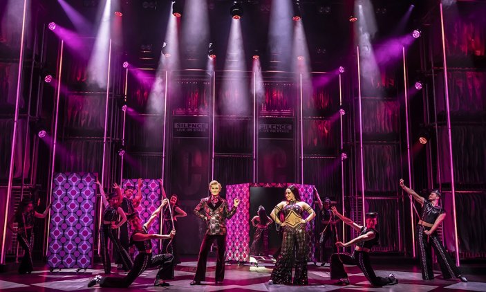 LtoR-centre-Jake-Mitchell-as-Bob-Mackie-Danielle-Steers-as-Lady-in-The-Cher-Show-credit-Pamela-Raith LtoR-centre-Jake-Mitchell-as-Bob-Mackie-Danielle-Steers-as-Lady-in-The-Cher-Show-credit-Pamela-Raith