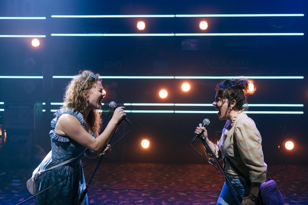 Thelma & Louise by Callie Khouri;
Production Photography;
Cast: Rachel Tucker, Amy Lennox, Jordan Luke Gage, Trevor Dion Nicholas, Samuel Edwards, Alex Gibson-Giorgio, Tamlyn Henderson, Letitia Hector;
Book by Callie Khouri;
Music & Lyrics by Neko Case;
Directed by Trip Cullman;
Choreography by Bobbi Jene Smith and Or Schraiber;
Musical Supervisor Kimberly Grigsby;
Scenography by Christine Jones and Brett J. Banakis;
Costume Design by Ryan Dawson Laight;
Lighting Design by Natasha Chivers;
Sound Design by Gareth Owen;
Orchestrator & Arranger John Clancy;
Music Director Ed Bussey;
Additional Music by Carl Newman, Paul Rigby and Zoe Sarnak;
Creative Producer Mandy Greenfield;
Creative Consultant Imogen Brodie;
Casting Director Stuart Burt CDG CSA;
Casting Associate Peter Noden;
Wigs, Hair and Make-Up Design by Carole Hancock;
Fight Director Kev McCurdy;
Voice & Dialect Coach Danièle Lydon;
Armourer Bare Arms;
Costume Supervisor Zoë Thomas-Webb;
Props Supervisor Mary Halliday;
Keyboard Programming by Billy Jay Stein and Hiro Iida for Strange Cranium;
Copyist J&J Music Preparation;
Associate Director Chelsea Walker;
Associate Choreographer Lily Ockwell;
Associate Designer Matthew Buttrey;
Associate Lighting Designer Stacey O'Shea;
Associate Sound Designer Rob Jones;
Jerwood Assistant Director Francesca Murray-Fuentes;
Music Producer Jeff Galegher;
Orchestra Manager Sylvia Addison;
US General Managers RCI Theatricals;
Production Managers Gary Beestone and Oli Bagwell Purefoy;
Company Stage Manager Matt Elesmore;
Deputy Stage Manager Hannah Halden;
Assistant Stage Manager (Book Cover) Frances Howell;
Assistant Stage Manager Jasmine Smith;
Young Vic, London, UK;
3 September 2026;
Photo: Helen Murray Thelma & Louise by Callie Khouri;
Production Photography;
Cast: Rachel Tucker, Amy Lennox, Jordan Luke Gage, Trevor Dion Nicholas, Samuel Edwards, Alex Gibson-Giorgio, Tamlyn Henderson, Letitia Hector;
Book by Callie Khouri;
Music & Lyrics by Neko Case;
Directed by Trip Cullman;
Choreography by Bobbi Jene Smith and Or Schraiber;
Musical Supervisor Kimberly Grigsby;
Scenography by Christine Jones and Brett J. Banakis;
Costume Design by Ryan Dawson Laight;
Lighting Design by Natasha Chivers;
Sound Design by Gareth Owen;
Orchestrator & Arranger John Clancy;
Music Director Ed Bussey;
Additional Music by Carl Newman, Paul Rigby and Zoe Sarnak;
Creative Producer Mandy Greenfield;
Creative Consultant Imogen Brodie;
Casting Director Stuart Burt CDG CSA;
Casting Associate Peter Noden;
Wigs, Hair and Make-Up Design by Carole Hancock;
Fight Director Kev McCurdy;
Voice & Dialect Coach Danièle Lydon;
Armourer Bare Arms;
Costume Supervisor Zoë Thomas-Webb;
Props Supervisor Mary Halliday;
Keyboard Programming by Billy Jay Stein and Hiro Iida for Strange Cranium;
Copyist J&J Music Preparation;
Associate Director Chelsea Walker;
Associate Choreographer Lily Ockwell;
Associate Designer Matthew Buttrey;
Associate Lighting Designer Stacey O'Shea;
Associate Sound Designer Rob Jones;
Jerwood Assistant Director Francesca Murray-Fuentes;
Music Producer Jeff Galegher;
Orchestra Manager Sylvia Addison;
US General Managers RCI Theatricals;
Production Managers Gary Beestone and Oli Bagwell Purefoy;
Company Stage Manager Matt Elesmore;
Deputy Stage Manager Hannah Halden;
Assistant Stage Manager (Book Cover) Frances Howell;
Assistant Stage Manager Jasmine Smith;
Young Vic, London, UK;
3 September 2026;
Photo: Helen Murray
