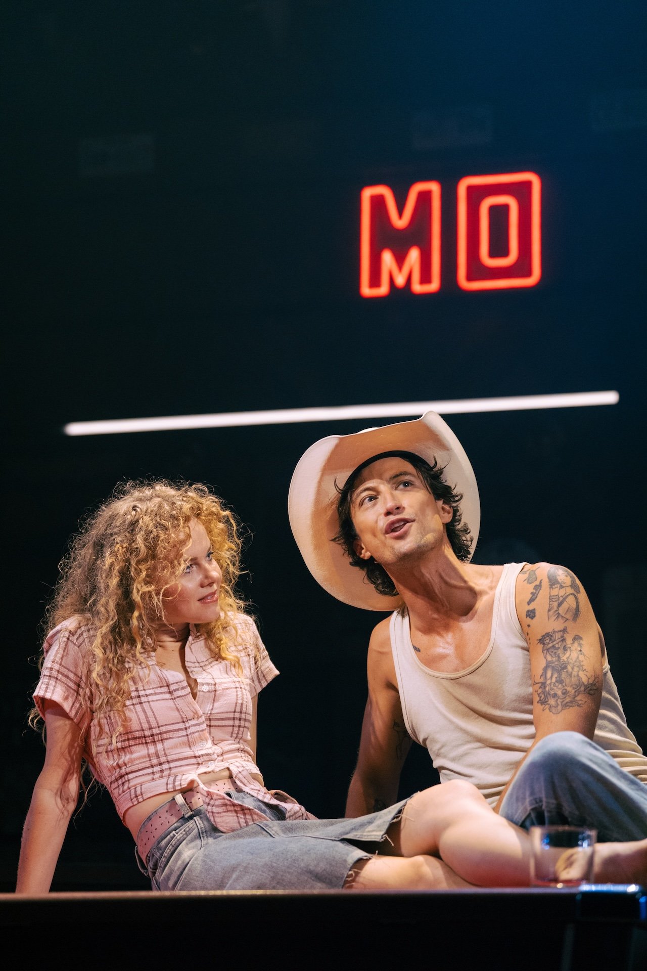 Thelma & Louise by Callie Khouri;
Production Photography;
Cast: Rachel Tucker, Amy Lennox, Jordan Luke Gage, Trevor Dion Nicholas, Samuel Edwards, Alex Gibson-Giorgio, Tamlyn Henderson, Letitia Hector;
Book by Callie Khouri;
Music & Lyrics by Neko Case;
Directed by Trip Cullman;
Choreography by Bobbi Jene Smith and Or Schraiber;
Musical Supervisor Kimberly Grigsby;
Scenography by Christine Jones and Brett J. Banakis;
Costume Design by Ryan Dawson Laight;
Lighting Design by Natasha Chivers;
Sound Design by Gareth Owen;
Orchestrator & Arranger John Clancy;
Music Director Ed Bussey;
Additional Music by Carl Newman, Paul Rigby and Zoe Sarnak;
Creative Producer Mandy Greenfield;
Creative Consultant Imogen Brodie;
Casting Director Stuart Burt CDG CSA;
Casting Associate Peter Noden;
Wigs, Hair and Make-Up Design by Carole Hancock;
Fight Director Kev McCurdy;
Voice & Dialect Coach Danièle Lydon;
Armourer Bare Arms;
Costume Supervisor Zoë Thomas-Webb;
Props Supervisor Mary Halliday;
Keyboard Programming by Billy Jay Stein and Hiro Iida for Strange Cranium;
Copyist J&J Music Preparation;
Associate Director Chelsea Walker;
Associate Choreographer Lily Ockwell;
Associate Designer Matthew Buttrey;
Associate Lighting Designer Stacey O'Shea;
Associate Sound Designer Rob Jones;
Jerwood Assistant Director Francesca Murray-Fuentes;
Music Producer Jeff Galegher;
Orchestra Manager Sylvia Addison;
US General Managers RCI Theatricals;
Production Managers Gary Beestone and Oli Bagwell Purefoy;
Company Stage Manager Matt Elesmore;
Deputy Stage Manager Hannah Halden;
Assistant Stage Manager (Book Cover) Frances Howell;
Assistant Stage Manager Jasmine Smith;
Young Vic, London, UK;
3 September 2026;
Photo: Helen Murray Thelma & Louise by Callie Khouri;
Production Photography;
Cast: Rachel Tucker, Amy Lennox, Jordan Luke Gage, Trevor Dion Nicholas, Samuel Edwards, Alex Gibson-Giorgio, Tamlyn Henderson, Letitia Hector;
Book by Callie Khouri;
Music & Lyrics by Neko Case;
Directed by Trip Cullman;
Choreography by Bobbi Jene Smith and Or Schraiber;
Musical Supervisor Kimberly Grigsby;
Scenography by Christine Jones and Brett J. Banakis;
Costume Design by Ryan Dawson Laight;
Lighting Design by Natasha Chivers;
Sound Design by Gareth Owen;
Orchestrator & Arranger John Clancy;
Music Director Ed Bussey;
Additional Music by Carl Newman, Paul Rigby and Zoe Sarnak;
Creative Producer Mandy Greenfield;
Creative Consultant Imogen Brodie;
Casting Director Stuart Burt CDG CSA;
Casting Associate Peter Noden;
Wigs, Hair and Make-Up Design by Carole Hancock;
Fight Director Kev McCurdy;
Voice & Dialect Coach Danièle Lydon;
Armourer Bare Arms;
Costume Supervisor Zoë Thomas-Webb;
Props Supervisor Mary Halliday;
Keyboard Programming by Billy Jay Stein and Hiro Iida for Strange Cranium;
Copyist J&J Music Preparation;
Associate Director Chelsea Walker;
Associate Choreographer Lily Ockwell;
Associate Designer Matthew Buttrey;
Associate Lighting Designer Stacey O'Shea;
Associate Sound Designer Rob Jones;
Jerwood Assistant Director Francesca Murray-Fuentes;
Music Producer Jeff Galegher;
Orchestra Manager Sylvia Addison;
US General Managers RCI Theatricals;
Production Managers Gary Beestone and Oli Bagwell Purefoy;
Company Stage Manager Matt Elesmore;
Deputy Stage Manager Hannah Halden;
Assistant Stage Manager (Book Cover) Frances Howell;
Assistant Stage Manager Jasmine Smith;
Young Vic, London, UK;
3 September 2026;
Photo: Helen Murray