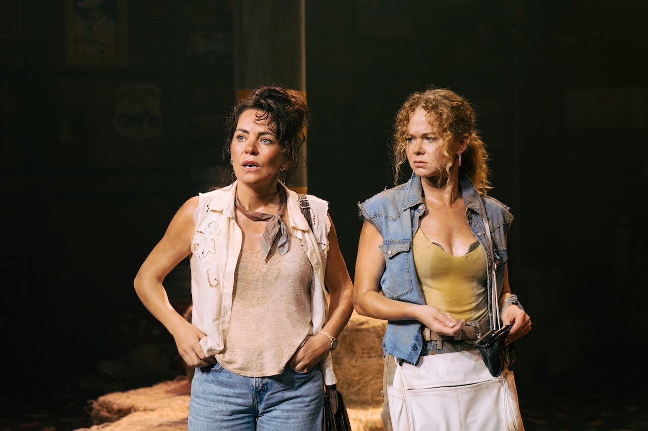 Thelma & Louise by Callie Khouri;
Production Photography;
Cast: Rachel Tucker, Amy Lennox, Jordan Luke Gage, Trevor Dion Nicholas, Samuel Edwards, Alex Gibson-Giorgio, Tamlyn Henderson, Letitia Hector;
Book by Callie Khouri;
Music & Lyrics by Neko Case;
Directed by Trip Cullman;
Choreography by Bobbi Jene Smith and Or Schraiber;
Musical Supervisor Kimberly Grigsby;
Scenography by Christine Jones and Brett J. Banakis;
Costume Design by Ryan Dawson Laight;
Lighting Design by Natasha Chivers;
Sound Design by Gareth Owen;
Orchestrator & Arranger John Clancy;
Music Director Ed Bussey;
Additional Music by Carl Newman, Paul Rigby and Zoe Sarnak;
Creative Producer Mandy Greenfield;
Creative Consultant Imogen Brodie;
Casting Director Stuart Burt CDG CSA;
Casting Associate Peter Noden;
Wigs, Hair and Make-Up Design by Carole Hancock;
Fight Director Kev McCurdy;
Voice & Dialect Coach Danièle Lydon;
Armourer Bare Arms;
Costume Supervisor Zoë Thomas-Webb;
Props Supervisor Mary Halliday;
Keyboard Programming by Billy Jay Stein and Hiro Iida for Strange Cranium;
Copyist J&J Music Preparation;
Associate Director Chelsea Walker;
Associate Choreographer Lily Ockwell;
Associate Designer Matthew Buttrey;
Associate Lighting Designer Stacey O'Shea;
Associate Sound Designer Rob Jones;
Jerwood Assistant Director Francesca Murray-Fuentes;
Music Producer Jeff Galegher;
Orchestra Manager Sylvia Addison;
US General Managers RCI Theatricals;
Production Managers Gary Beestone and Oli Bagwell Purefoy;
Company Stage Manager Matt Elesmore;
Deputy Stage Manager Hannah Halden;
Assistant Stage Manager (Book Cover) Frances Howell;
Assistant Stage Manager Jasmine Smith;
Young Vic, London, UK;
3 September 2026;
Photo: Helen Murray Thelma & Louise by Callie Khouri;
Production Photography;
Cast: Rachel Tucker, Amy Lennox, Jordan Luke Gage, Trevor Dion Nicholas, Samuel Edwards, Alex Gibson-Giorgio, Tamlyn Henderson, Letitia Hector;
Book by Callie Khouri;
Music & Lyrics by Neko Case;
Directed by Trip Cullman;
Choreography by Bobbi Jene Smith and Or Schraiber;
Musical Supervisor Kimberly Grigsby;
Scenography by Christine Jones and Brett J. Banakis;
Costume Design by Ryan Dawson Laight;
Lighting Design by Natasha Chivers;
Sound Design by Gareth Owen;
Orchestrator & Arranger John Clancy;
Music Director Ed Bussey;
Additional Music by Carl Newman, Paul Rigby and Zoe Sarnak;
Creative Producer Mandy Greenfield;
Creative Consultant Imogen Brodie;
Casting Director Stuart Burt CDG CSA;
Casting Associate Peter Noden;
Wigs, Hair and Make-Up Design by Carole Hancock;
Fight Director Kev McCurdy;
Voice & Dialect Coach Danièle Lydon;
Armourer Bare Arms;
Costume Supervisor Zoë Thomas-Webb;
Props Supervisor Mary Halliday;
Keyboard Programming by Billy Jay Stein and Hiro Iida for Strange Cranium;
Copyist J&J Music Preparation;
Associate Director Chelsea Walker;
Associate Choreographer Lily Ockwell;
Associate Designer Matthew Buttrey;
Associate Lighting Designer Stacey O'Shea;
Associate Sound Designer Rob Jones;
Jerwood Assistant Director Francesca Murray-Fuentes;
Music Producer Jeff Galegher;
Orchestra Manager Sylvia Addison;
US General Managers RCI Theatricals;
Production Managers Gary Beestone and Oli Bagwell Purefoy;
Company Stage Manager Matt Elesmore;
Deputy Stage Manager Hannah Halden;
Assistant Stage Manager (Book Cover) Frances Howell;
Assistant Stage Manager Jasmine Smith;
Young Vic, London, UK;
3 September 2026;
Photo: Helen Murray