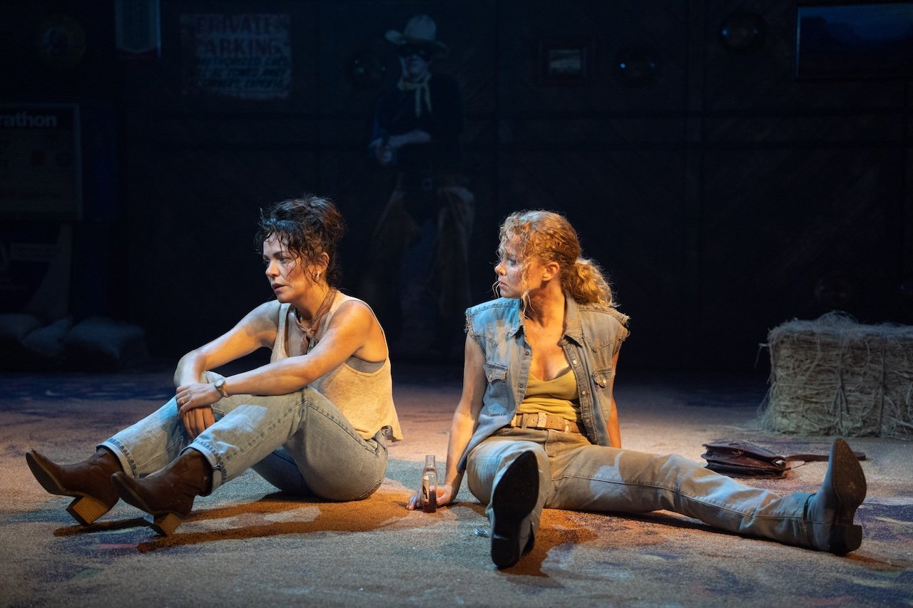 Thelma & Louise by Callie Khouri;
Production Photography;
Cast: Rachel Tucker, Amy Lennox, Jordan Luke Gage, Trevor Dion Nicholas, Samuel Edwards, Alex Gibson-Giorgio, Tamlyn Henderson, Letitia Hector;
Book by Callie Khouri;
Music & Lyrics by Neko Case;
Directed by Trip Cullman;
Choreography by Bobbi Jene Smith and Or Schraiber;
Musical Supervisor Kimberly Grigsby;
Scenography by Christine Jones and Brett J. Banakis;
Costume Design by Ryan Dawson Laight;
Lighting Design by Natasha Chivers;
Sound Design by Gareth Owen;
Orchestrator & Arranger John Clancy;
Music Director Ed Bussey;
Additional Music by Carl Newman, Paul Rigby and Zoe Sarnak;
Creative Producer Mandy Greenfield;
Creative Consultant Imogen Brodie;
Casting Director Stuart Burt CDG CSA;
Casting Associate Peter Noden;
Wigs, Hair and Make-Up Design by Carole Hancock;
Fight Director Kev McCurdy;
Voice & Dialect Coach Danièle Lydon;
Armourer Bare Arms;
Costume Supervisor Zoë Thomas-Webb;
Props Supervisor Mary Halliday;
Keyboard Programming by Billy Jay Stein and Hiro Iida for Strange Cranium;
Copyist J&J Music Preparation;
Associate Director Chelsea Walker;
Associate Choreographer Lily Ockwell;
Associate Designer Matthew Buttrey;
Associate Lighting Designer Stacey O'Shea;
Associate Sound Designer Rob Jones;
Jerwood Assistant Director Francesca Murray-Fuentes;
Music Producer Jeff Galegher;
Orchestra Manager Sylvia Addison;
US General Managers RCI Theatricals;
Production Managers Gary Beestone and Oli Bagwell Purefoy;
Company Stage Manager Matt Elesmore;
Deputy Stage Manager Hannah Halden;
Assistant Stage Manager (Book Cover) Frances Howell;
Assistant Stage Manager Jasmine Smith;
Young Vic, London, UK;
3 September 2026;
Photo: Helen Murray Thelma & Louise by Callie Khouri;
Production Photography;
Cast: Rachel Tucker, Amy Lennox, Jordan Luke Gage, Trevor Dion Nicholas, Samuel Edwards, Alex Gibson-Giorgio, Tamlyn Henderson, Letitia Hector;
Book by Callie Khouri;
Music & Lyrics by Neko Case;
Directed by Trip Cullman;
Choreography by Bobbi Jene Smith and Or Schraiber;
Musical Supervisor Kimberly Grigsby;
Scenography by Christine Jones and Brett J. Banakis;
Costume Design by Ryan Dawson Laight;
Lighting Design by Natasha Chivers;
Sound Design by Gareth Owen;
Orchestrator & Arranger John Clancy;
Music Director Ed Bussey;
Additional Music by Carl Newman, Paul Rigby and Zoe Sarnak;
Creative Producer Mandy Greenfield;
Creative Consultant Imogen Brodie;
Casting Director Stuart Burt CDG CSA;
Casting Associate Peter Noden;
Wigs, Hair and Make-Up Design by Carole Hancock;
Fight Director Kev McCurdy;
Voice & Dialect Coach Danièle Lydon;
Armourer Bare Arms;
Costume Supervisor Zoë Thomas-Webb;
Props Supervisor Mary Halliday;
Keyboard Programming by Billy Jay Stein and Hiro Iida for Strange Cranium;
Copyist J&J Music Preparation;
Associate Director Chelsea Walker;
Associate Choreographer Lily Ockwell;
Associate Designer Matthew Buttrey;
Associate Lighting Designer Stacey O'Shea;
Associate Sound Designer Rob Jones;
Jerwood Assistant Director Francesca Murray-Fuentes;
Music Producer Jeff Galegher;
Orchestra Manager Sylvia Addison;
US General Managers RCI Theatricals;
Production Managers Gary Beestone and Oli Bagwell Purefoy;
Company Stage Manager Matt Elesmore;
Deputy Stage Manager Hannah Halden;
Assistant Stage Manager (Book Cover) Frances Howell;
Assistant Stage Manager Jasmine Smith;
Young Vic, London, UK;
3 September 2026;
Photo: Helen Murray