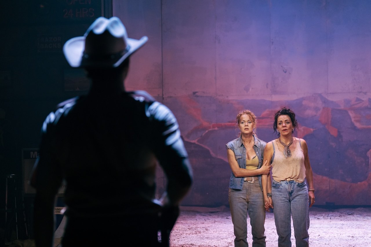 Thelma & Louise by Callie Khouri;
Production Photography;
Cast: Rachel Tucker, Amy Lennox, Jordan Luke Gage, Trevor Dion Nicholas, Samuel Edwards, Alex Gibson-Giorgio, Tamlyn Henderson, Letitia Hector;
Book by Callie Khouri;
Music & Lyrics by Neko Case;
Directed by Trip Cullman;
Choreography by Bobbi Jene Smith and Or Schraiber;
Musical Supervisor Kimberly Grigsby;
Scenography by Christine Jones and Brett J. Banakis;
Costume Design by Ryan Dawson Laight;
Lighting Design by Natasha Chivers;
Sound Design by Gareth Owen;
Orchestrator & Arranger John Clancy;
Music Director Ed Bussey;
Additional Music by Carl Newman, Paul Rigby and Zoe Sarnak;
Creative Producer Mandy Greenfield;
Creative Consultant Imogen Brodie;
Casting Director Stuart Burt CDG CSA;
Casting Associate Peter Noden;
Wigs, Hair and Make-Up Design by Carole Hancock;
Fight Director Kev McCurdy;
Voice & Dialect Coach Danièle Lydon;
Armourer Bare Arms;
Costume Supervisor Zoë Thomas-Webb;
Props Supervisor Mary Halliday;
Keyboard Programming by Billy Jay Stein and Hiro Iida for Strange Cranium;
Copyist J&J Music Preparation;
Associate Director Chelsea Walker;
Associate Choreographer Lily Ockwell;
Associate Designer Matthew Buttrey;
Associate Lighting Designer Stacey O'Shea;
Associate Sound Designer Rob Jones;
Jerwood Assistant Director Francesca Murray-Fuentes;
Music Producer Jeff Galegher;
Orchestra Manager Sylvia Addison;
US General Managers RCI Theatricals;
Production Managers Gary Beestone and Oli Bagwell Purefoy;
Company Stage Manager Matt Elesmore;
Deputy Stage Manager Hannah Halden;
Assistant Stage Manager (Book Cover) Frances Howell;
Assistant Stage Manager Jasmine Smith;
Young Vic, London, UK;
3 September 2026;
Photo: Helen Murray Thelma & Louise by Callie Khouri;
Production Photography;
Cast: Rachel Tucker, Amy Lennox, Jordan Luke Gage, Trevor Dion Nicholas, Samuel Edwards, Alex Gibson-Giorgio, Tamlyn Henderson, Letitia Hector;
Book by Callie Khouri;
Music & Lyrics by Neko Case;
Directed by Trip Cullman;
Choreography by Bobbi Jene Smith and Or Schraiber;
Musical Supervisor Kimberly Grigsby;
Scenography by Christine Jones and Brett J. Banakis;
Costume Design by Ryan Dawson Laight;
Lighting Design by Natasha Chivers;
Sound Design by Gareth Owen;
Orchestrator & Arranger John Clancy;
Music Director Ed Bussey;
Additional Music by Carl Newman, Paul Rigby and Zoe Sarnak;
Creative Producer Mandy Greenfield;
Creative Consultant Imogen Brodie;
Casting Director Stuart Burt CDG CSA;
Casting Associate Peter Noden;
Wigs, Hair and Make-Up Design by Carole Hancock;
Fight Director Kev McCurdy;
Voice & Dialect Coach Danièle Lydon;
Armourer Bare Arms;
Costume Supervisor Zoë Thomas-Webb;
Props Supervisor Mary Halliday;
Keyboard Programming by Billy Jay Stein and Hiro Iida for Strange Cranium;
Copyist J&J Music Preparation;
Associate Director Chelsea Walker;
Associate Choreographer Lily Ockwell;
Associate Designer Matthew Buttrey;
Associate Lighting Designer Stacey O'Shea;
Associate Sound Designer Rob Jones;
Jerwood Assistant Director Francesca Murray-Fuentes;
Music Producer Jeff Galegher;
Orchestra Manager Sylvia Addison;
US General Managers RCI Theatricals;
Production Managers Gary Beestone and Oli Bagwell Purefoy;
Company Stage Manager Matt Elesmore;
Deputy Stage Manager Hannah Halden;
Assistant Stage Manager (Book Cover) Frances Howell;
Assistant Stage Manager Jasmine Smith;
Young Vic, London, UK;
3 September 2026;
Photo: Helen Murray