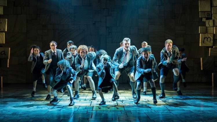 the cast performing Matilda the Musical
