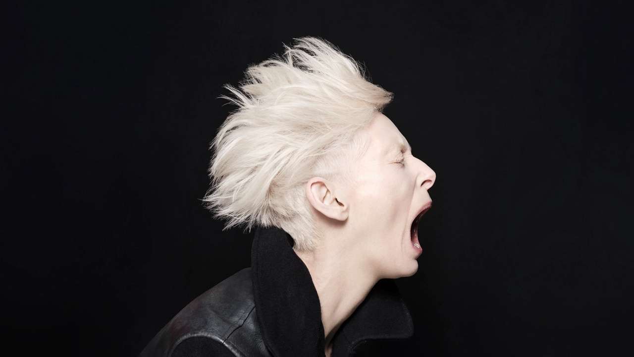 Side profile of Tilda Swinton screaming in Man to Man at the Royal Court Theatre London