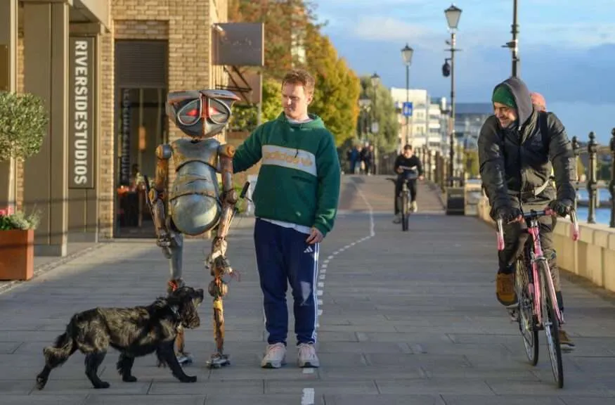 A man and a puppet robot. The Hitchhikers Guide to the Galaxy - Marvin the Paranoid Android. Photo by J Hordle