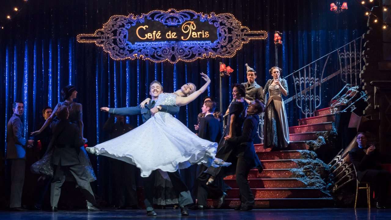 A man and a woman dancing on stage. Matthew Bourne's Cinderella. Photo by Johan Persson