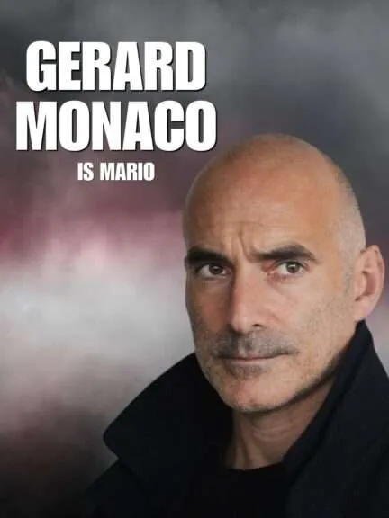 Head-and-shoulders portrait of Gerard Monaco against a smoky background with bold white text reading 'GERARD MONACO IS MARIO'.