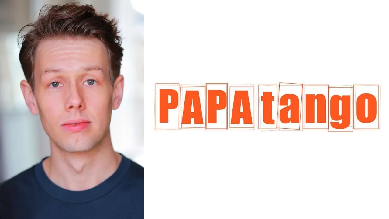 Portrait of a young man with short brown hair in a dark shirt, next to the orange 'PAPA tango' logo on a white background.