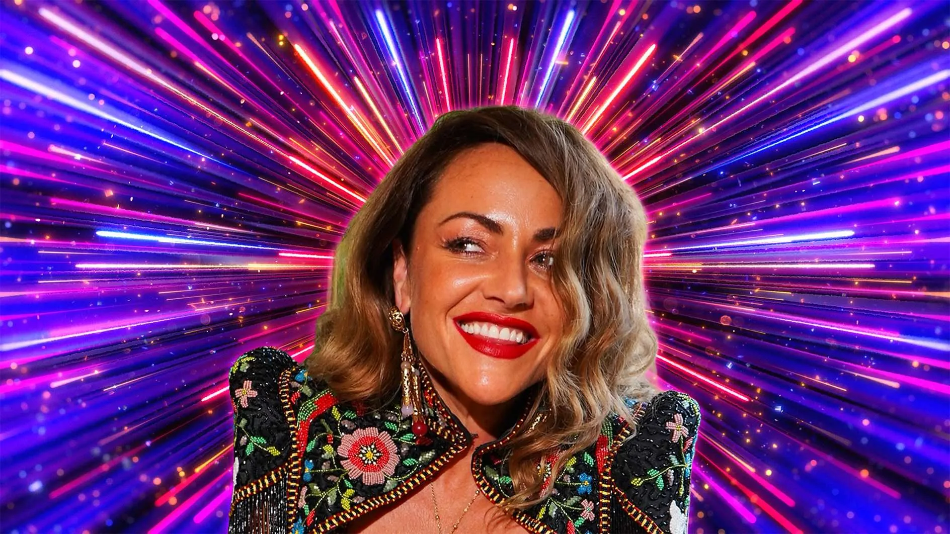 Smiling woman in a colorful embroidered outfit with a neon burst of purple and pink lights behind her (portrait-style image).