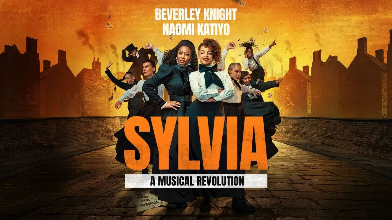 Poster for 'Sylvia: A Musical Revolution' featuring a group of performers in period costumes against an orange cityscape background, large orange title text S Y L V I A.