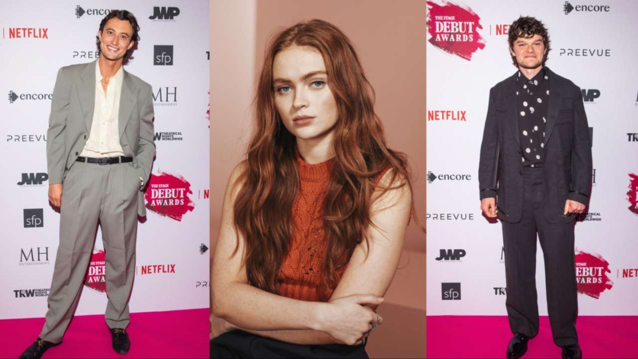 Two winners pose on the red carpet in front of the step-and-repeat, either side of a studio portrait of Sadie Sink