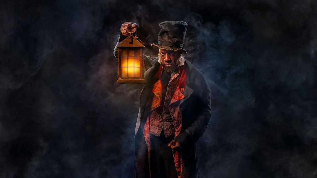 Giles Terera as Scrooge at The Old Vic. Photo by Hugo Glendinning